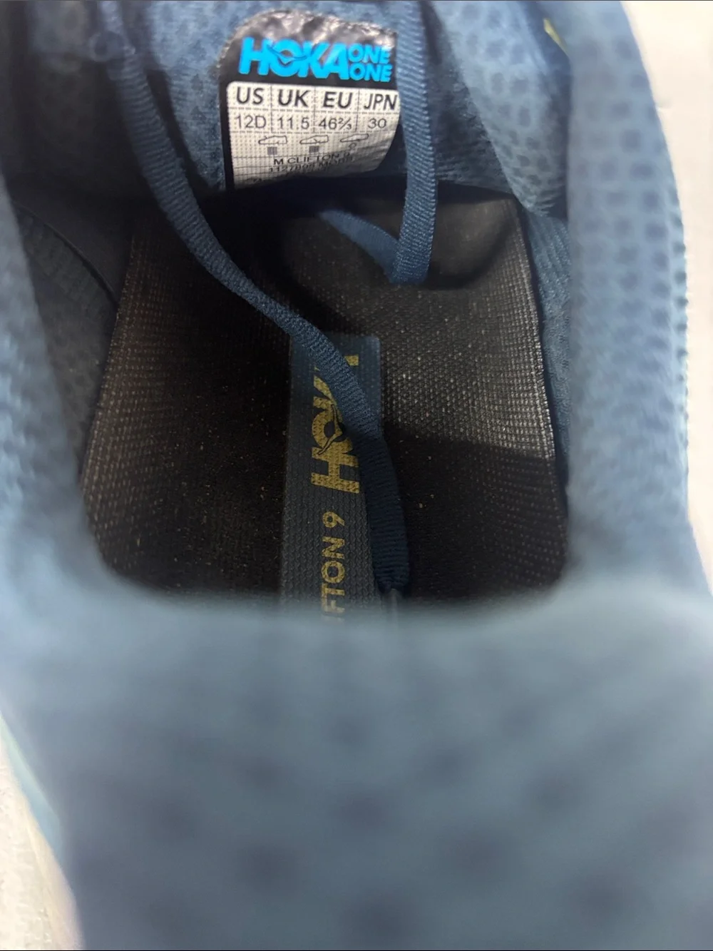 Hoka Blue Running Shoes with Yellow Logo
